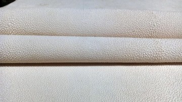 Daphoco International Joint Stock Company supplies stingray leather material (Faux shagreen) for furniture industry.